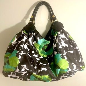 Floral satin shoulder bag w/double handles (patent). Color Black, Green, White.